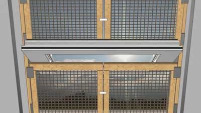 Dachfenster mit Holzrahmen und Gitter